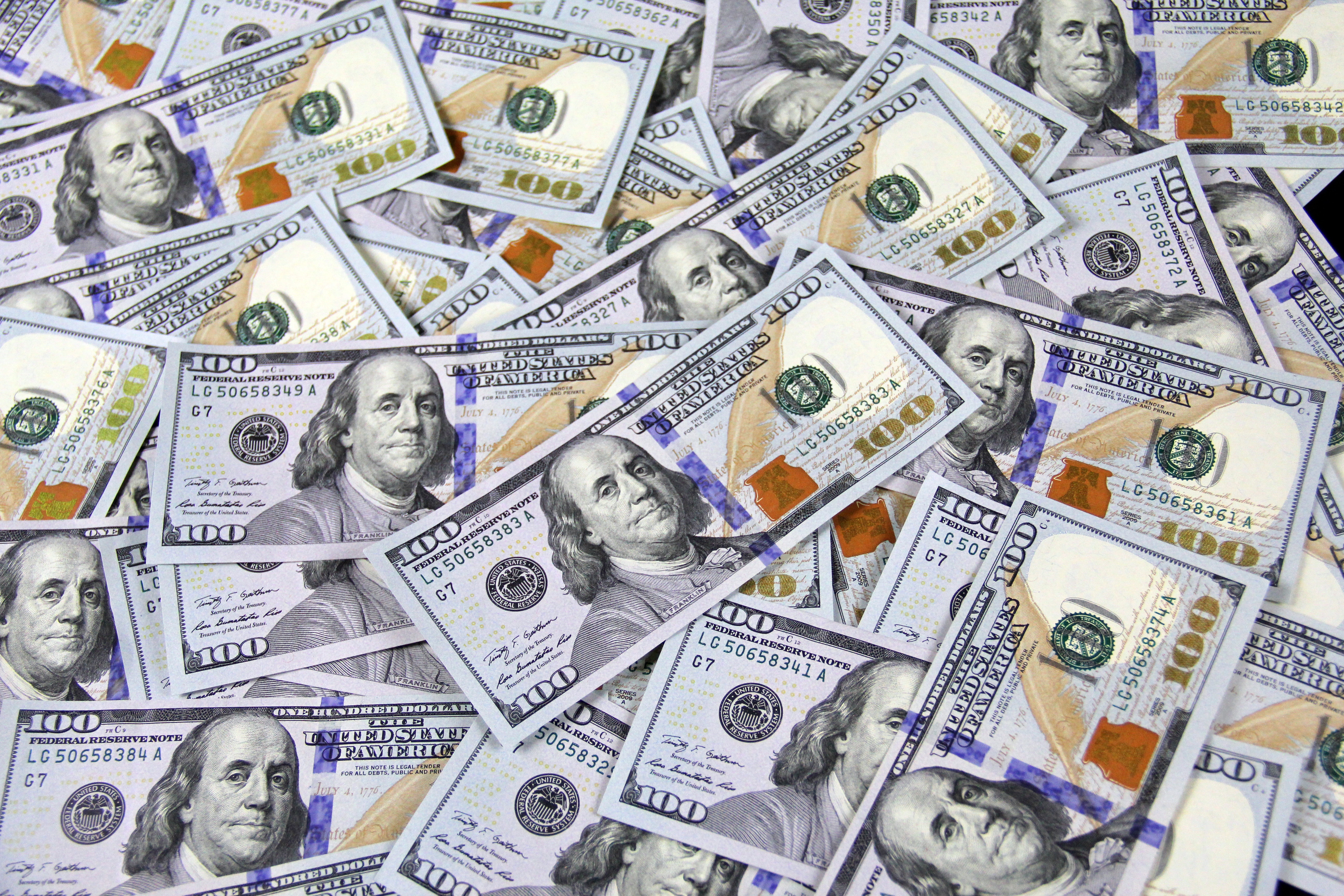 Photo by John Guccione www.advergroup.com from Pexels 100 US Dollar Banknotes